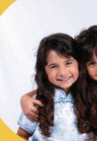 Two friends hugging